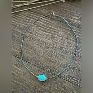 Very delicate hand beaded necklace.